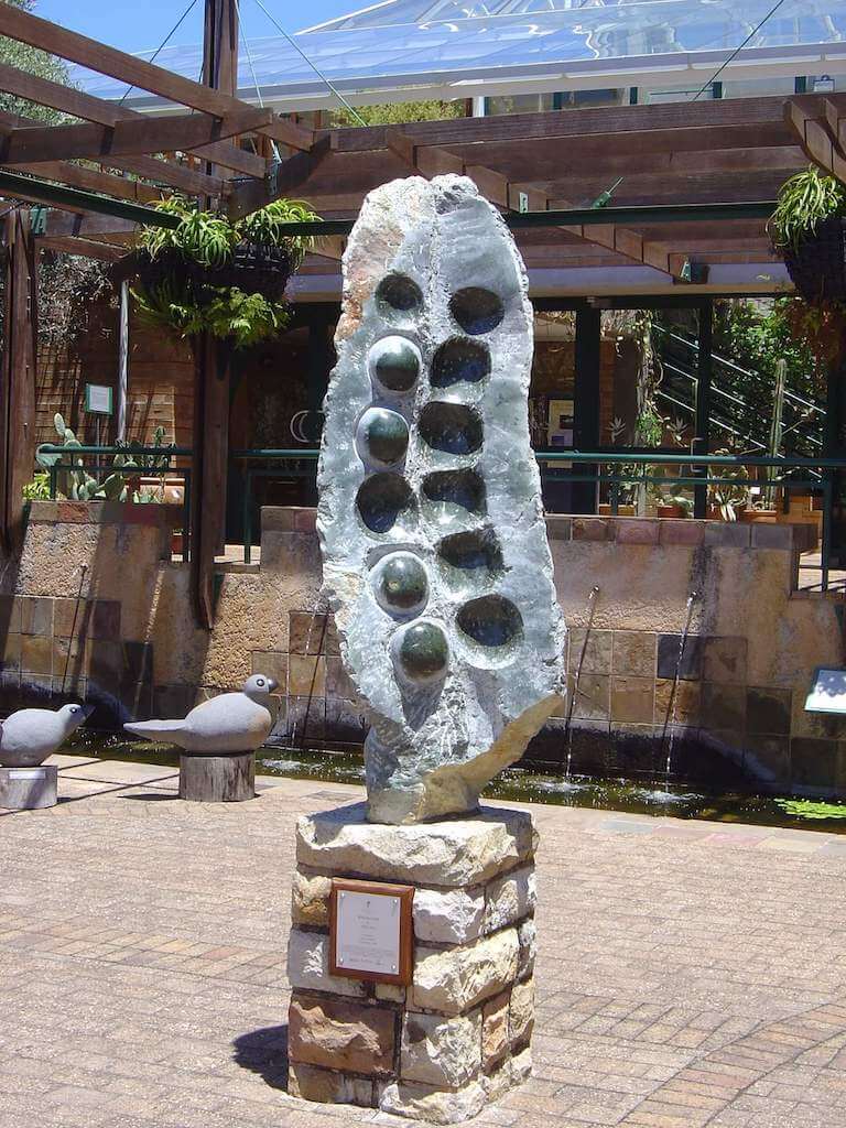 large sculpture imitating the inside of a seed pod